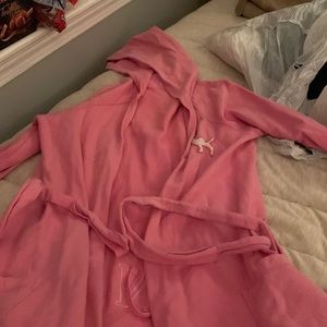 Pink, bathrobe , lightly worn, will keep you warm, soft material!